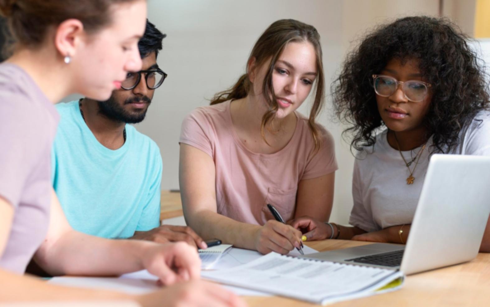 Financial educator reviewing budget strategies with client materials